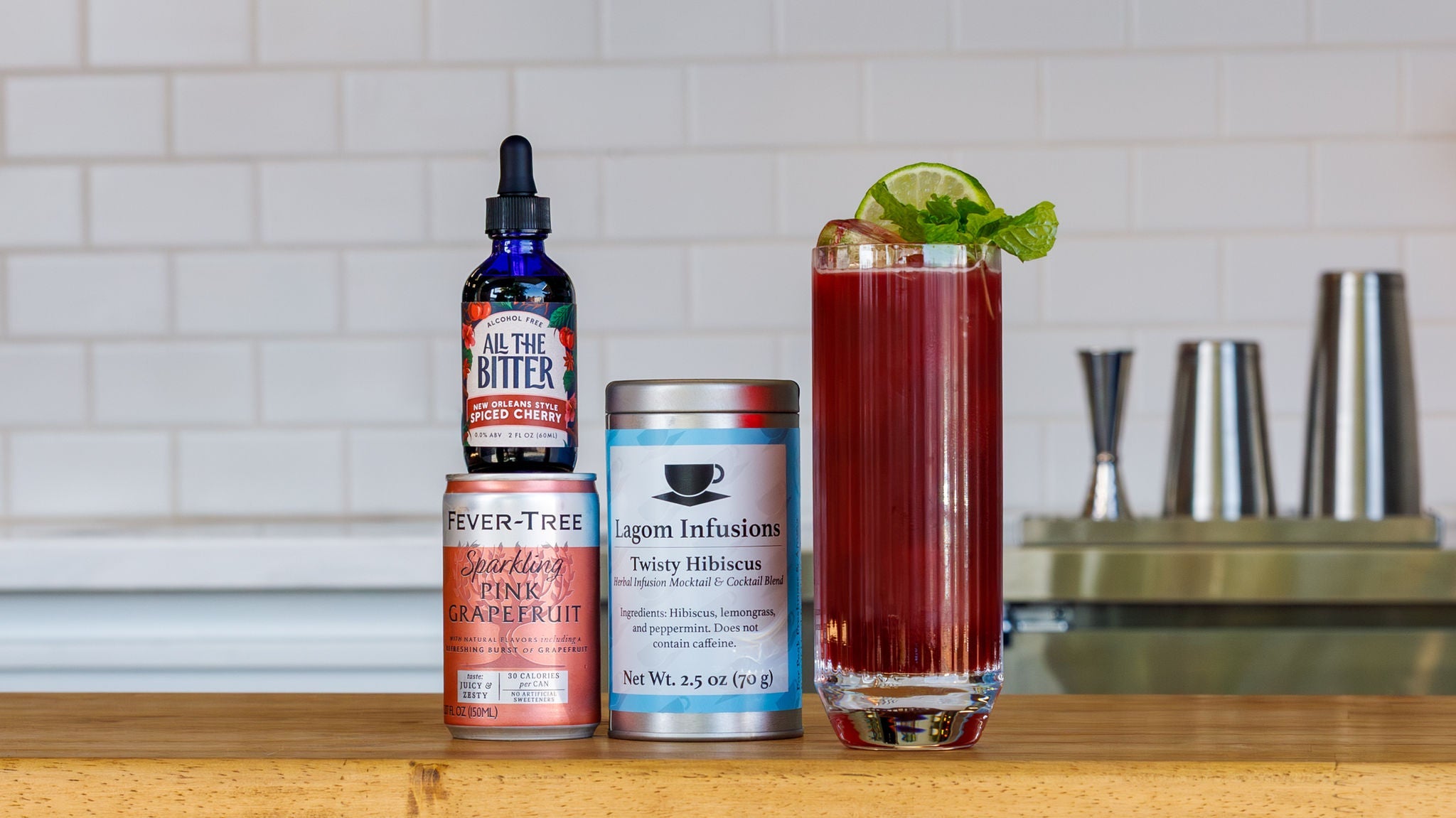 Picture of a Paloma mocktail made with hibiscus tea and nonalcoholic cocktail bitters.