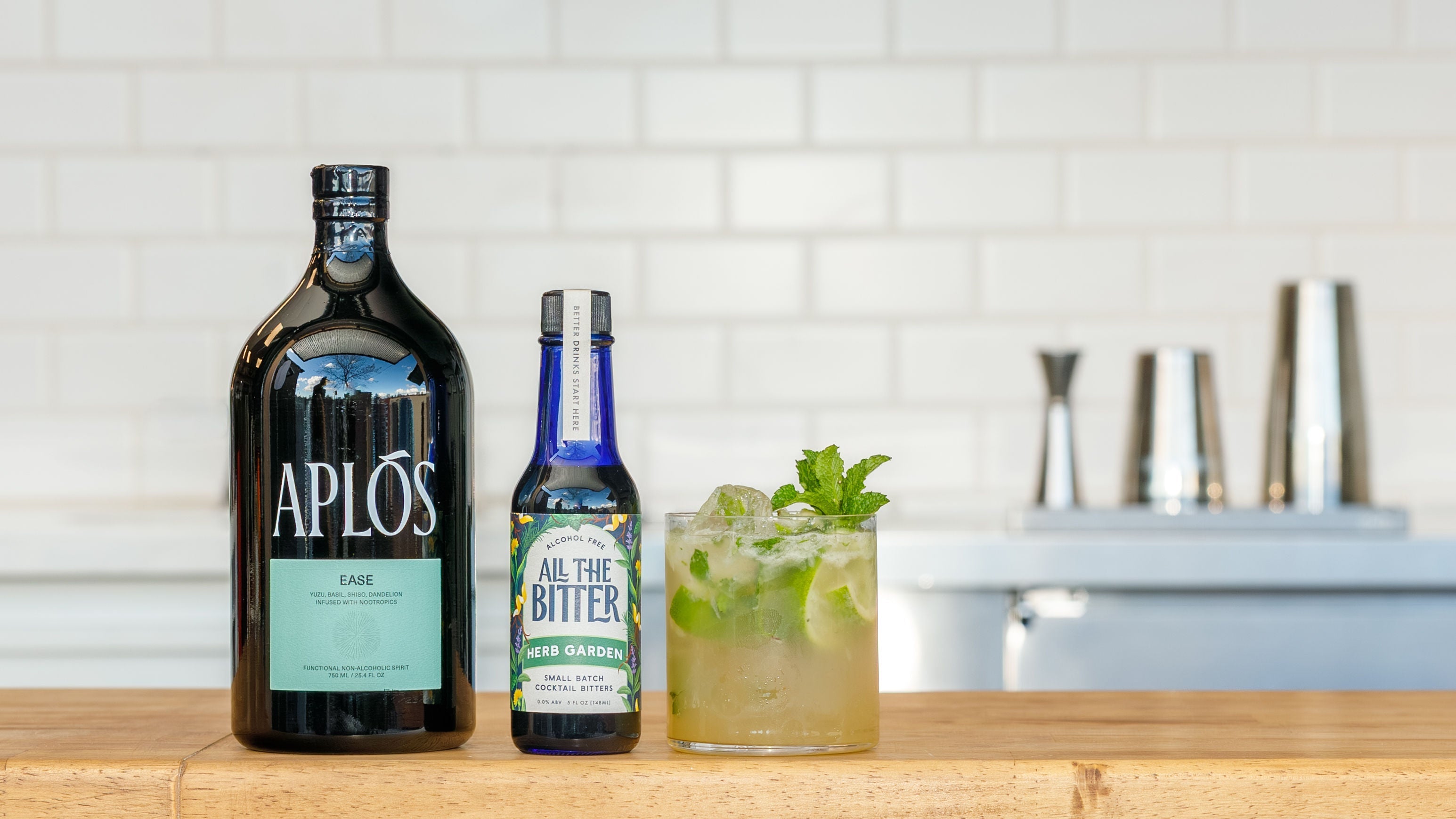 Non-alcoholic cocktail made with Aplos Ease and mint bitters, inspired by a Mojito and Caipirinha.