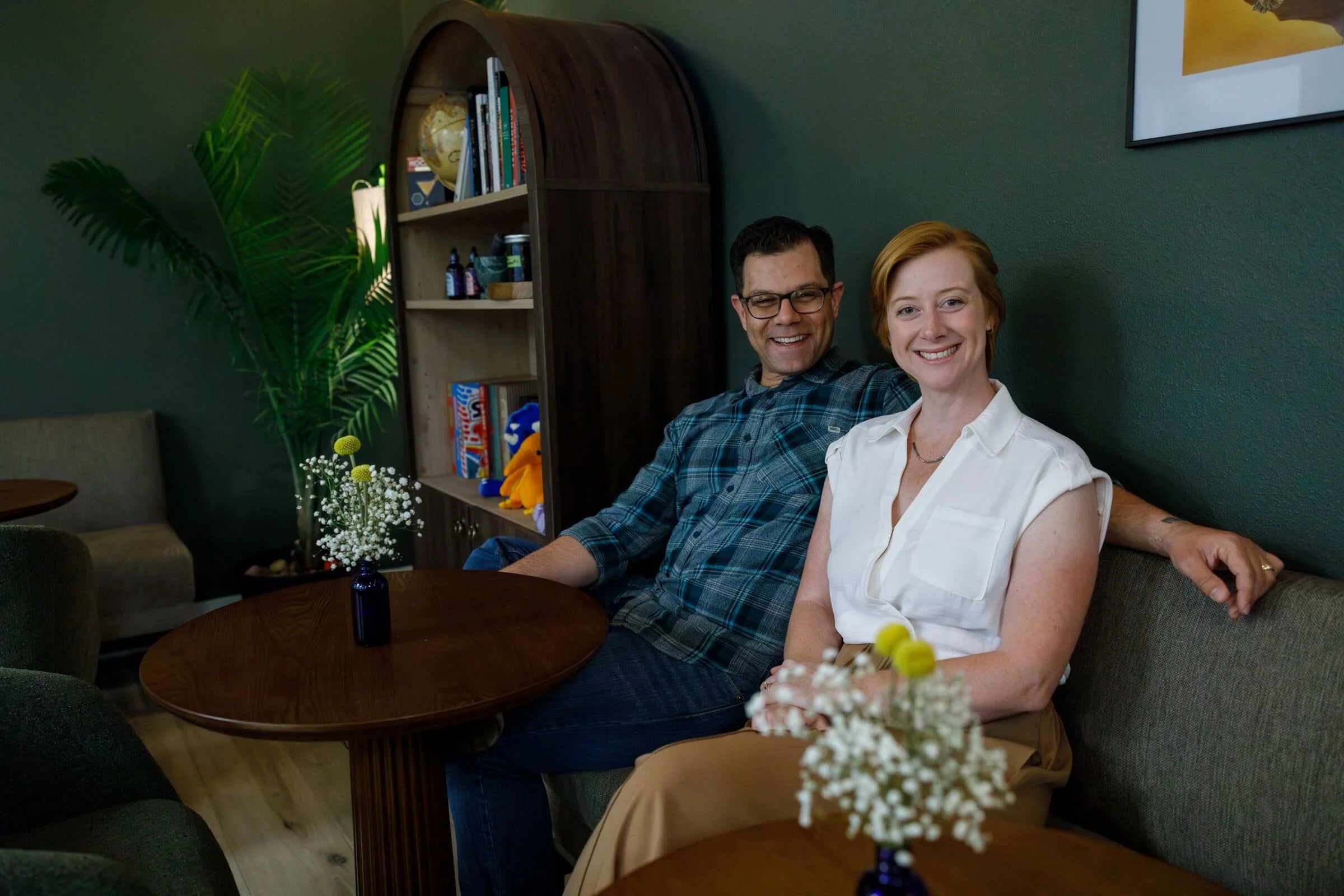 Co-founders Carly and Ian sitting in the All The Bitter Zero Proof Lounge.