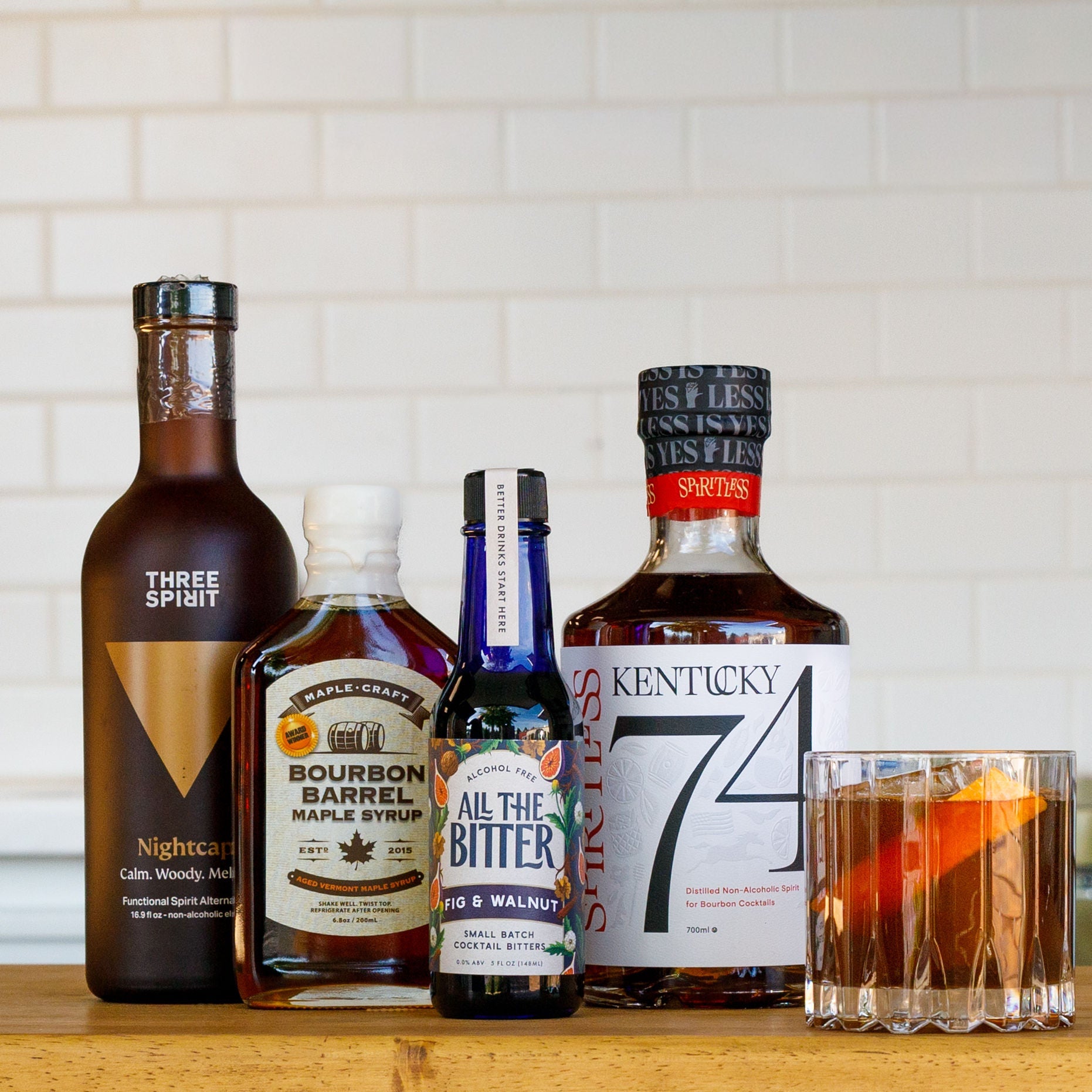 non alcoholic maple old fashioned cocktail with kentucky 74 and three spirit nightcap