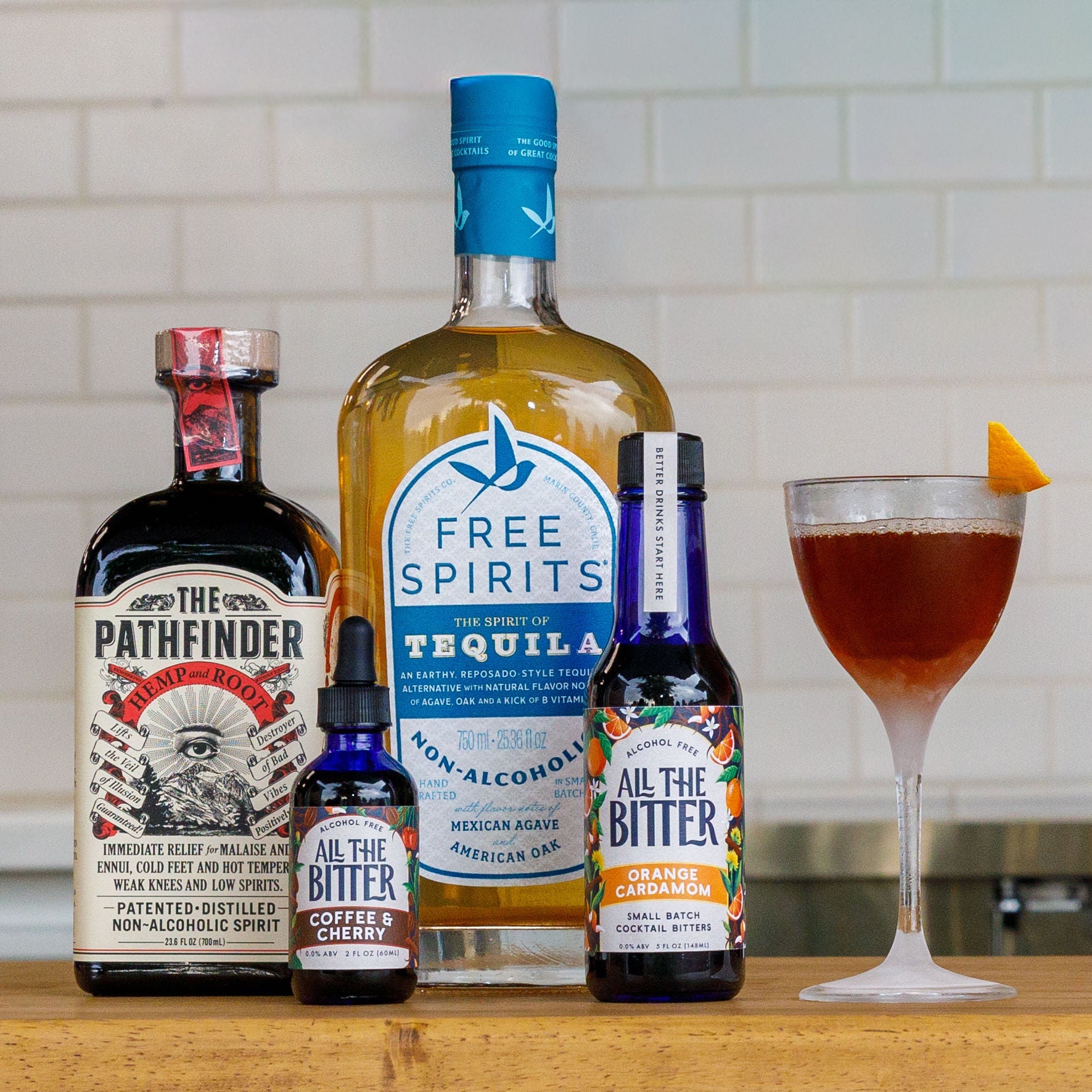 Free Spirits Tequila, The Pathfinder, and All The Bitter non-alcoholic bitters with a non-alcoholic tequila Manhattan cocktail.